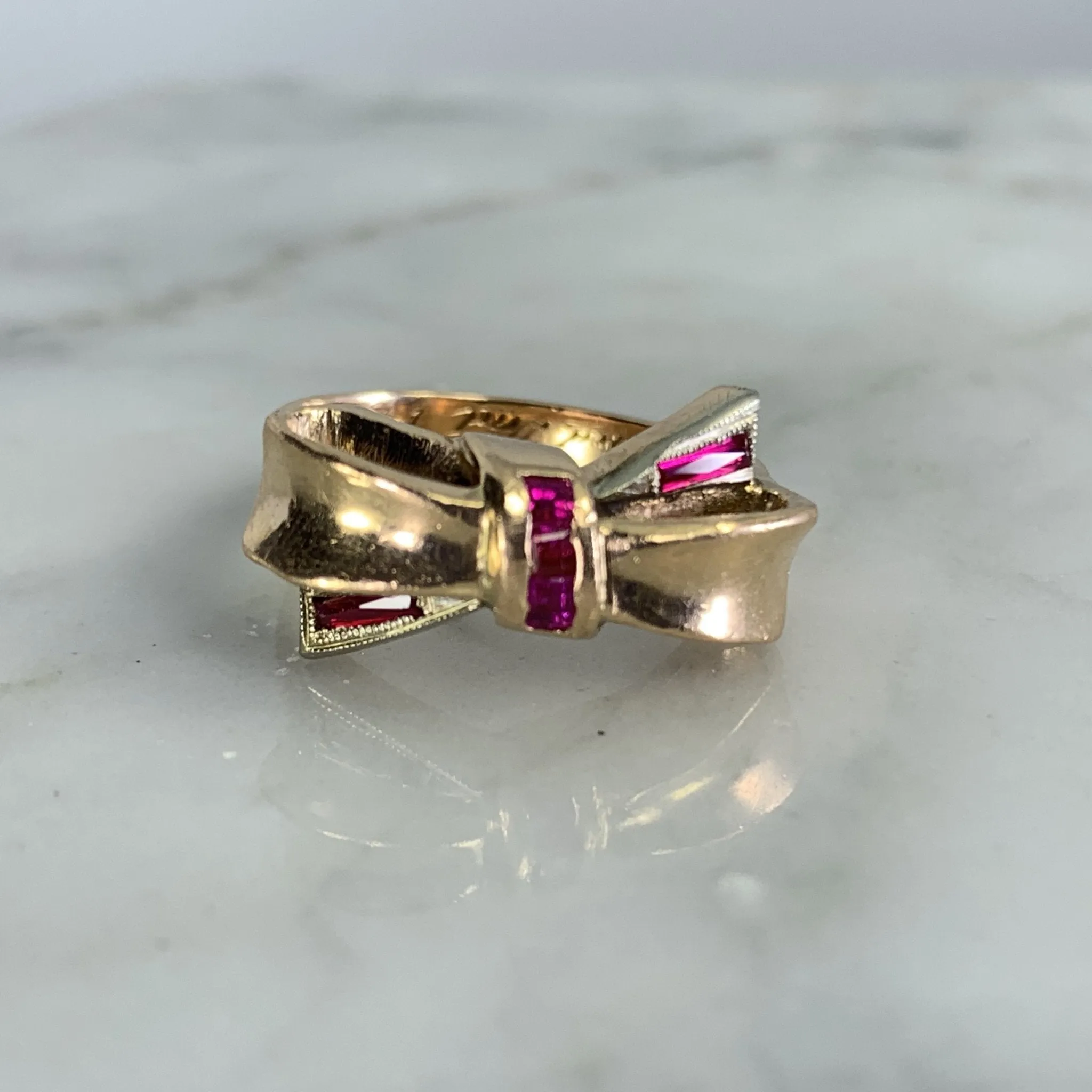 1940s Ruby Bow Shaped Ring set in 14K Yellow Gold. July Birthstone. 15th Anniversary Gift.