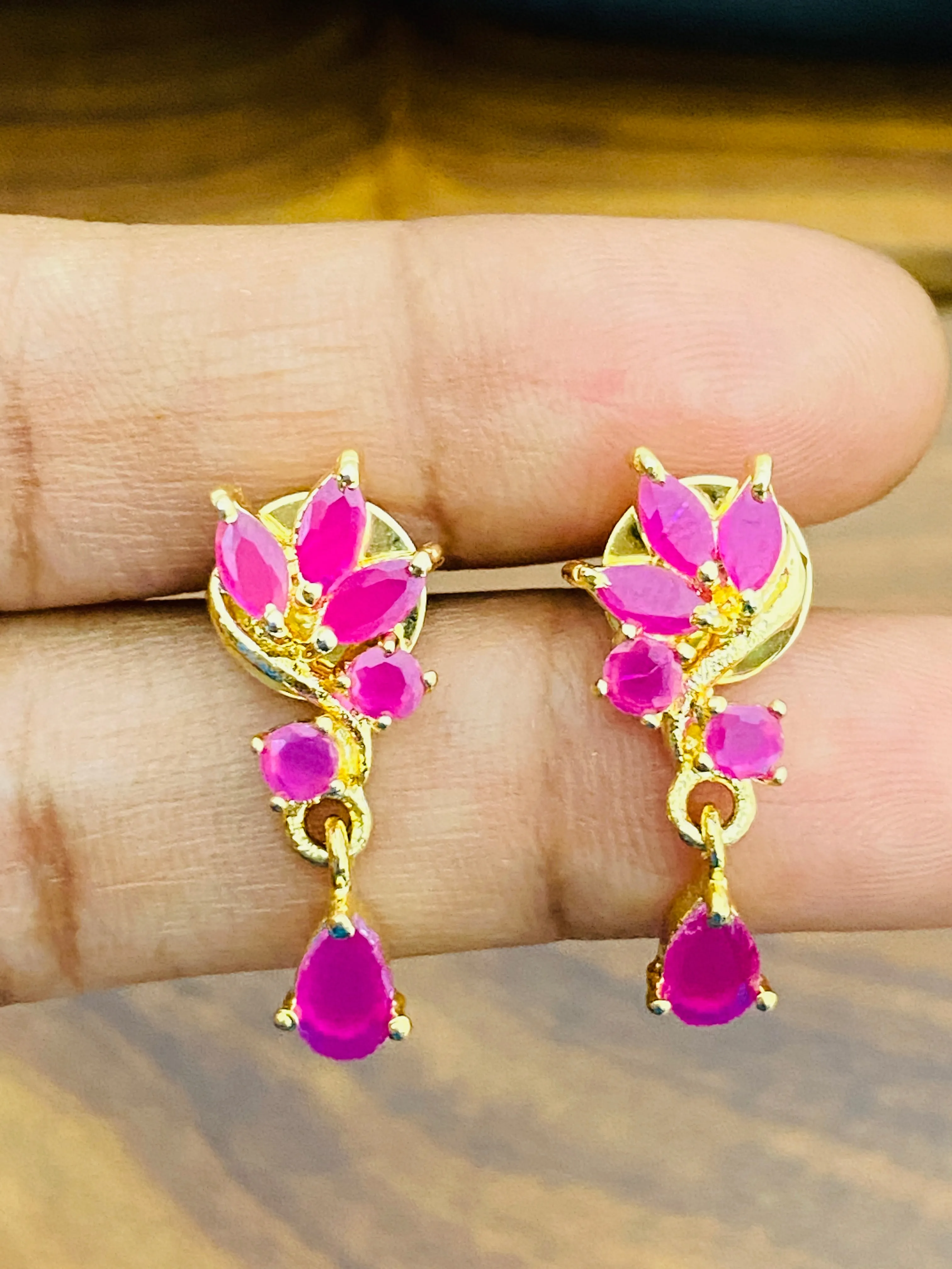 Elegant Ruby Stoned Gold Plated Earrings With Drops